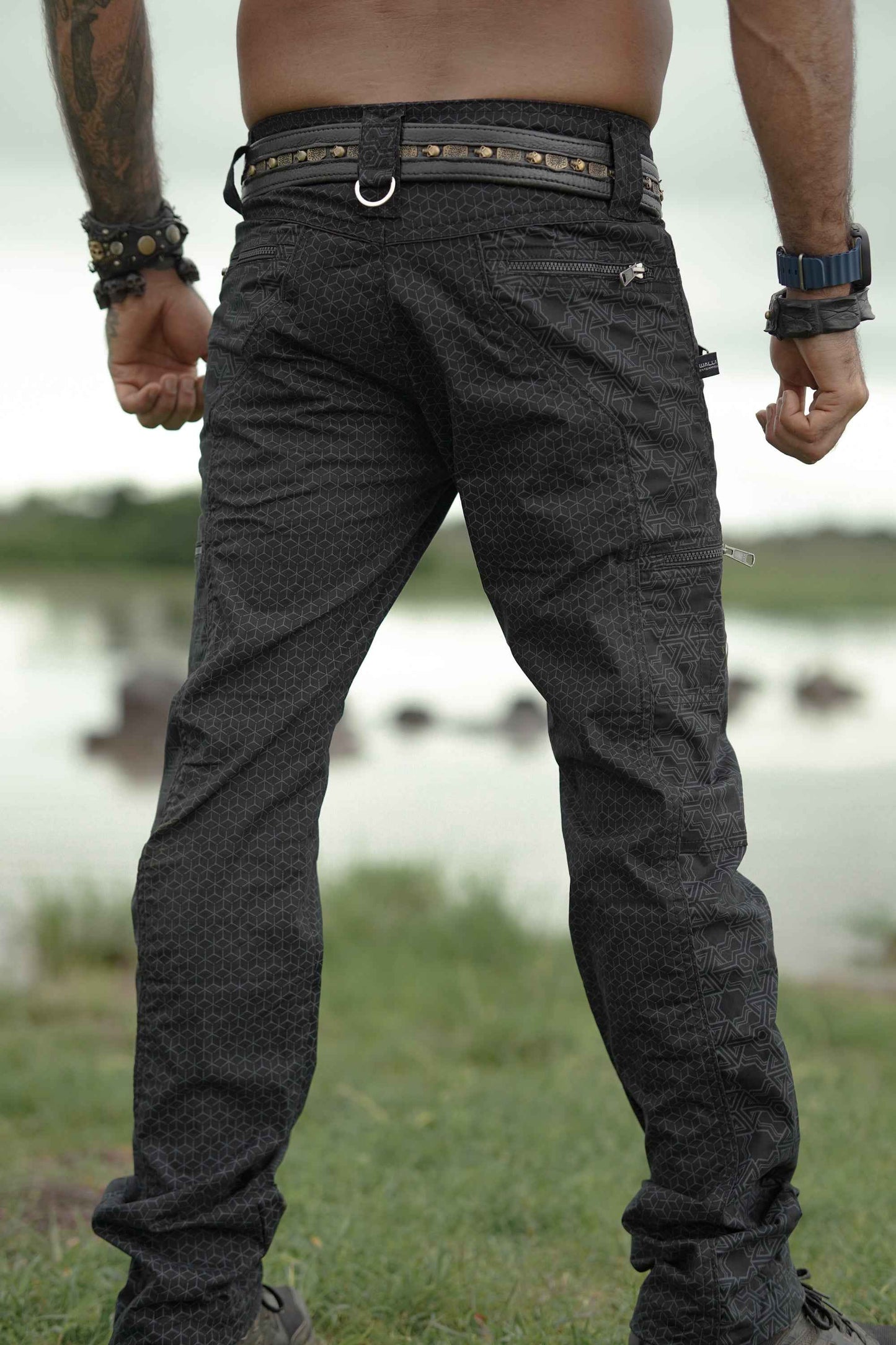 black psychedelic cargo pants back view multi pocket design