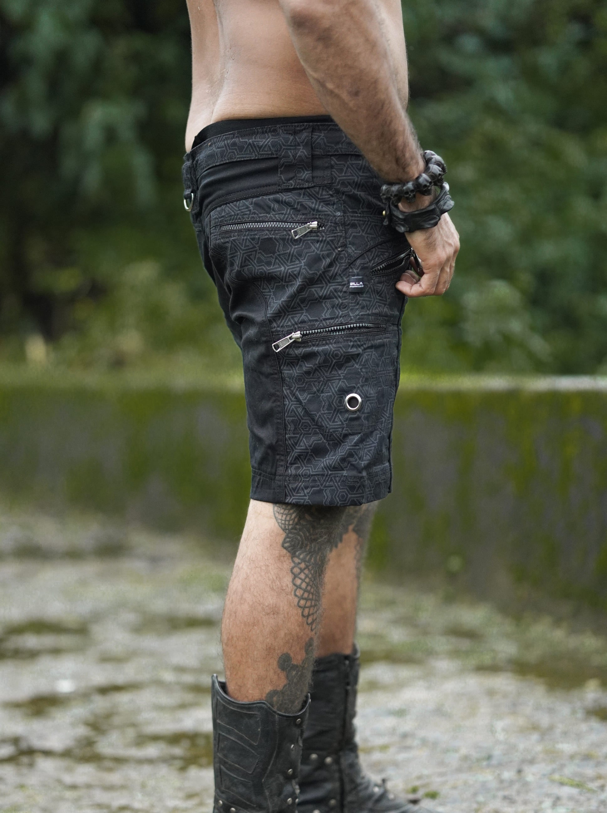 pythagoras jet black shorts side angle zipper pocket detail